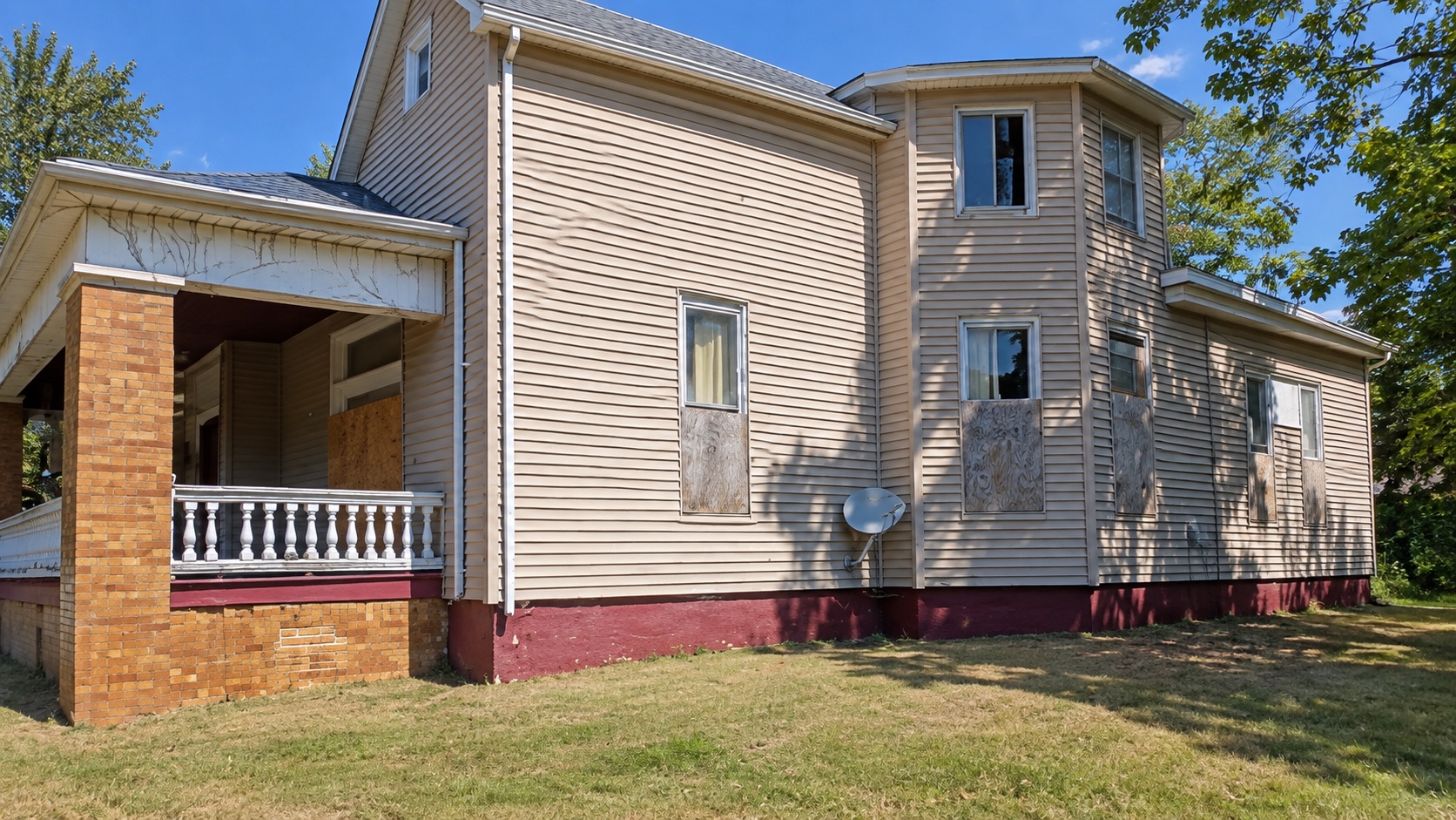 AI-assisted reframed current-condition side exterior of the triplex