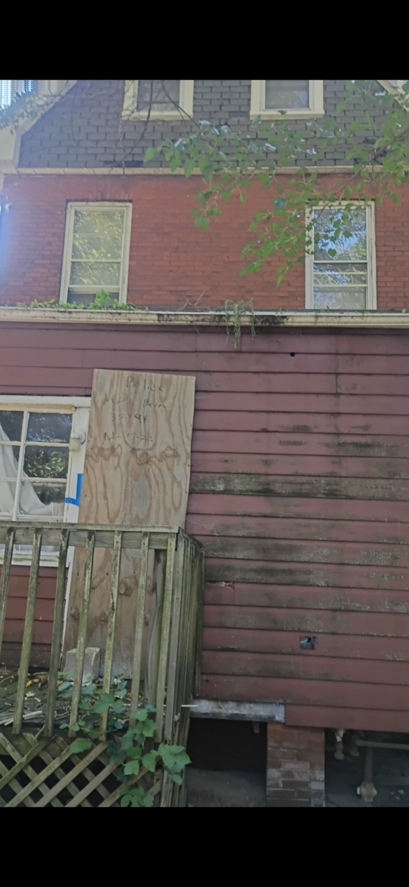 Rear exterior condition at 805 Northeast Perry Avenue